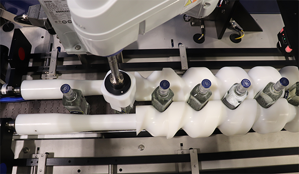Screw-Fed Robotic Inline Orientor