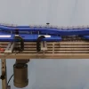 Versatile Container Handling System for Multi-Size Packaging Lines